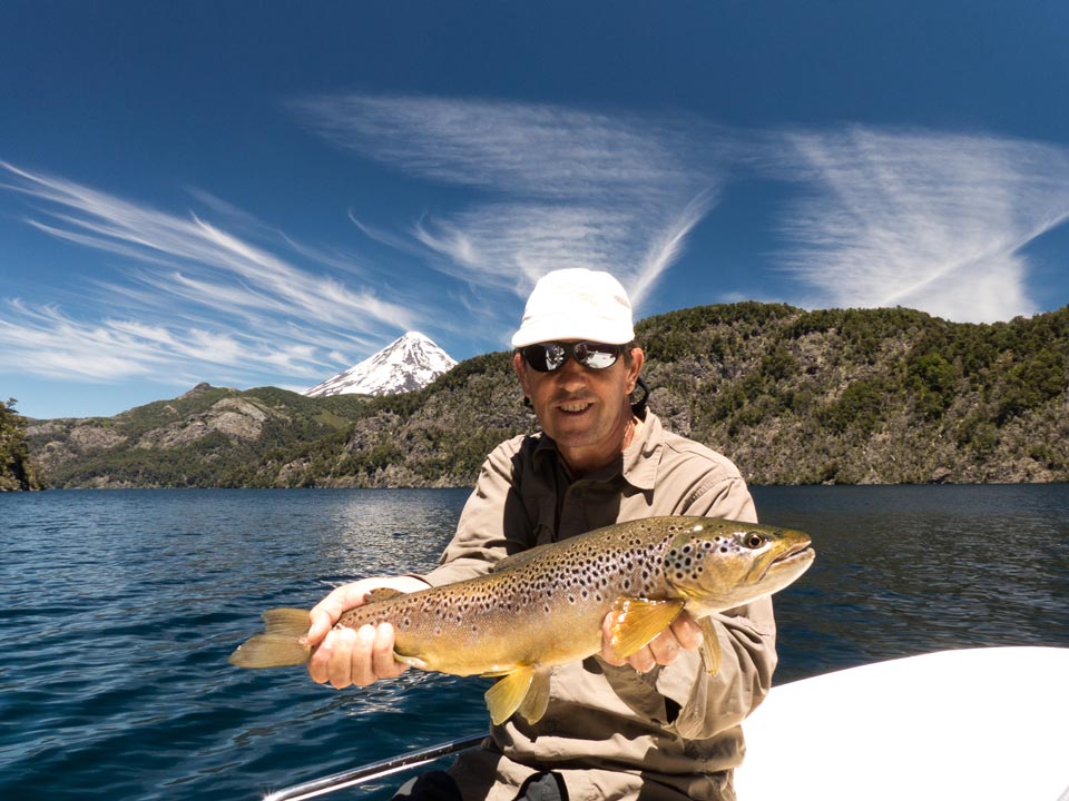 Fly fishing with dries on the Tomen Lake - Patagonia Argentina.